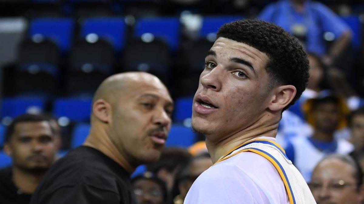 LaVar Ball (left) and his son Lonzo (right) debuted a signature basketball shoe Thursday (AP Photo/Mark J. Terrill)