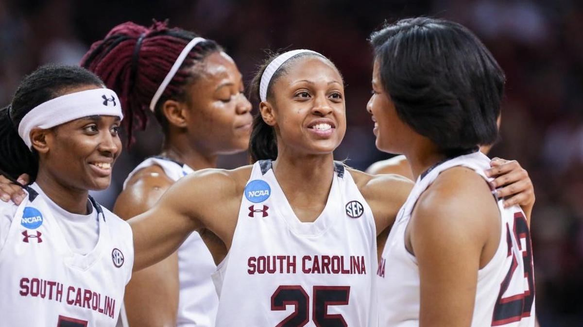 Seniors Khadijah Sessions, Sarah Imovbioh, Tiffany Mitchell (25) and Tina Roy take in the moment during the second half of action in the second round of the NCAA Division 1 basketball championship at the Colonial Life Arena. South Carolina won, 73-47 and will head to the Sweet 16 where they will play Syracuse on Friday. 3/20/16