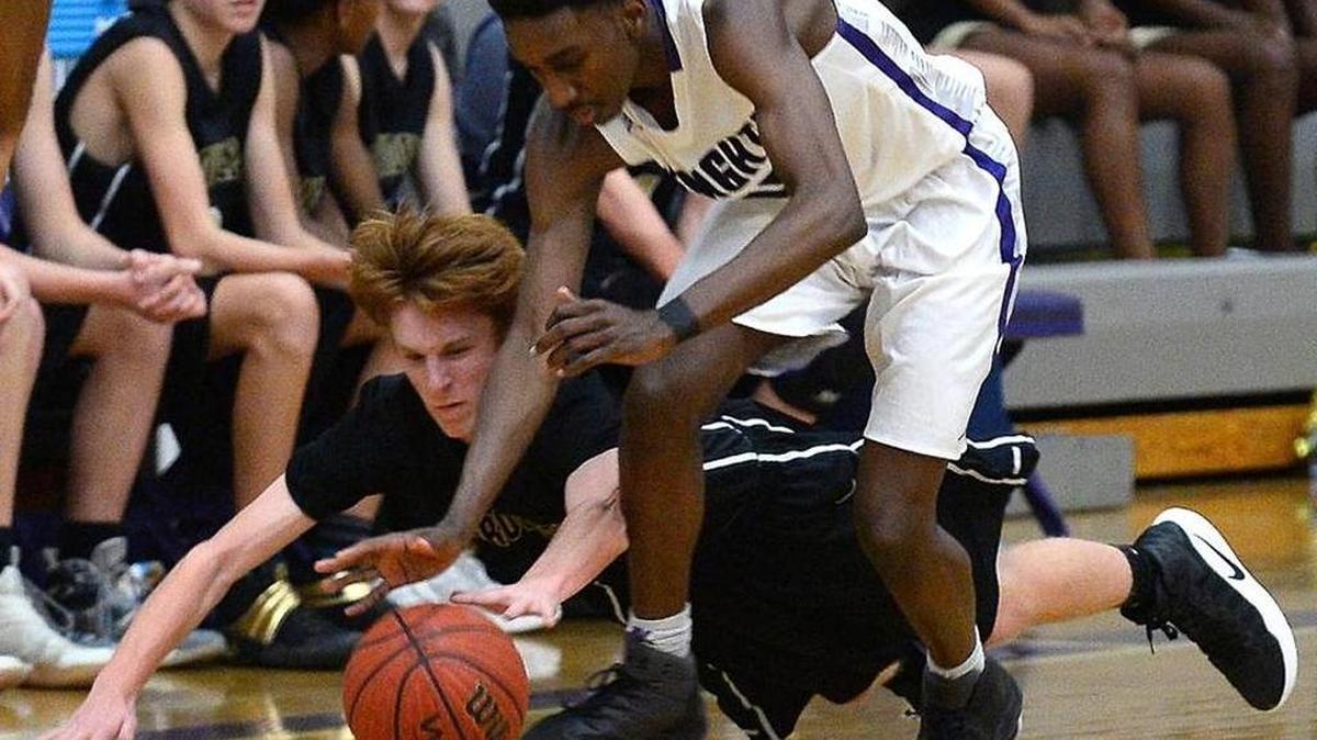 Ardrey Kell’s David Kasaganay (right) helped his team to a first round win in the SoMeck 8 tournament Monday