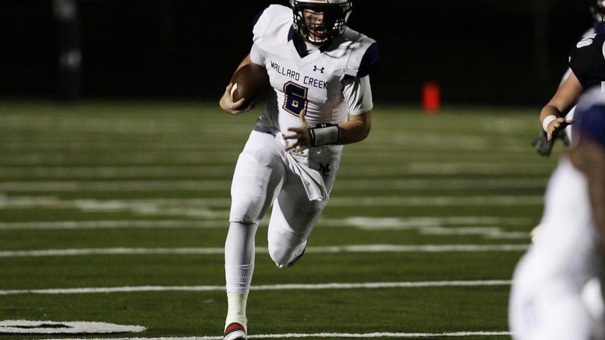 Mallard Creek QB Casey Kelly picked up a first down in the first half on this scramble against Hough.