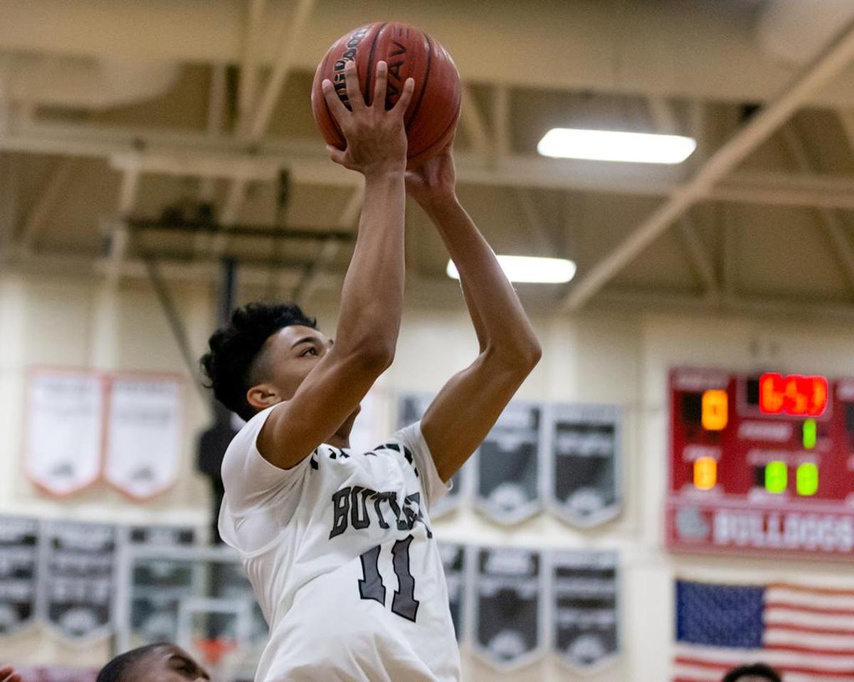 Butler’s Moses Payne drives the baseline for the layup against Butler Thursday.