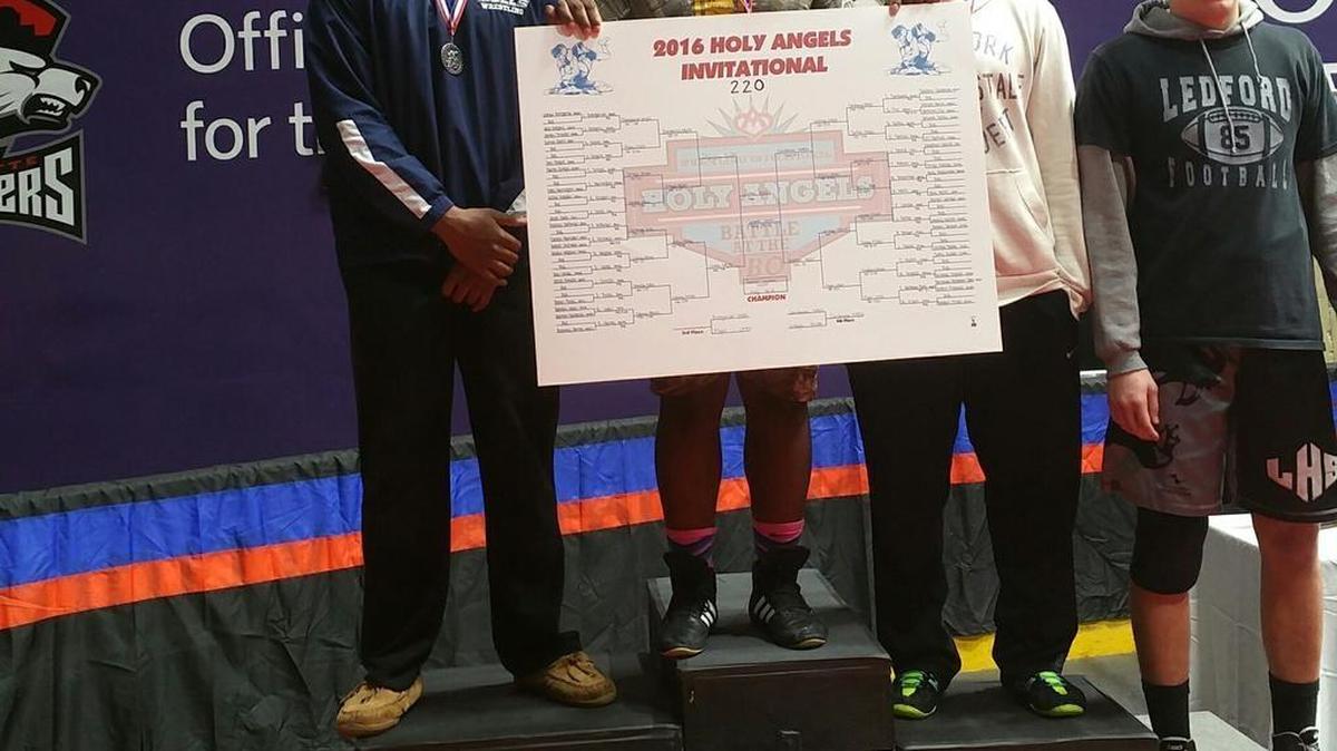 Independence wrestler Xavier Lanear won the 220-pound championship at the Holy Angels Invitational at Bojangles Coliseum last weekend