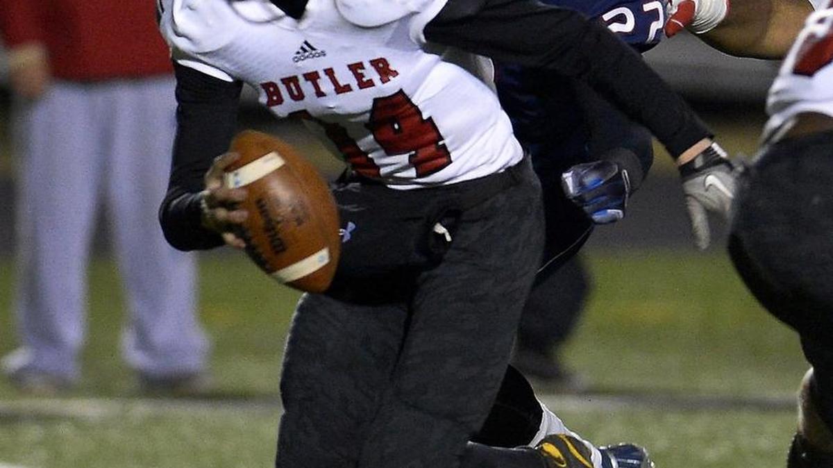 Butler quarterback Davis Cheek, left, pictured against Mallard Creek in 2014, will get another shot at the Mavericks next Friday.