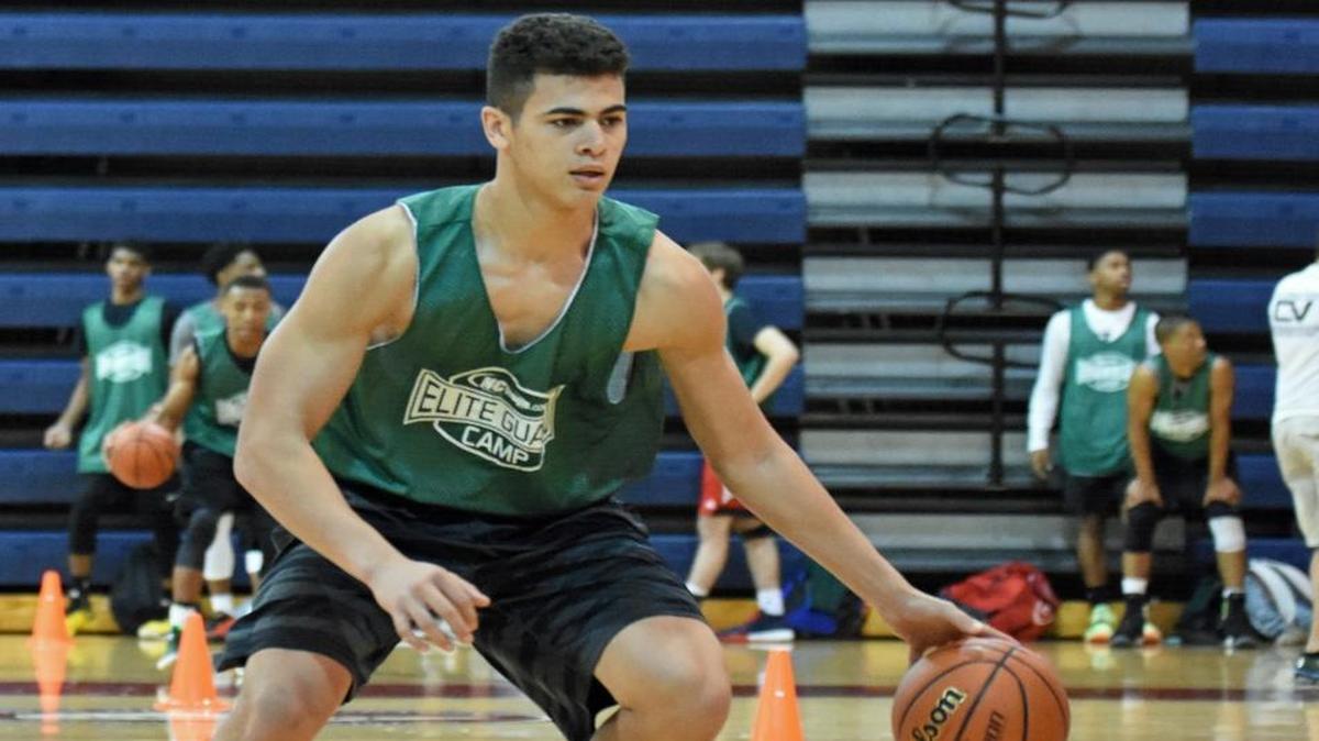 East Lincoln junior Sage Surratt goes through a ballhandling drill at an NCPreps.com showcase Saturday.