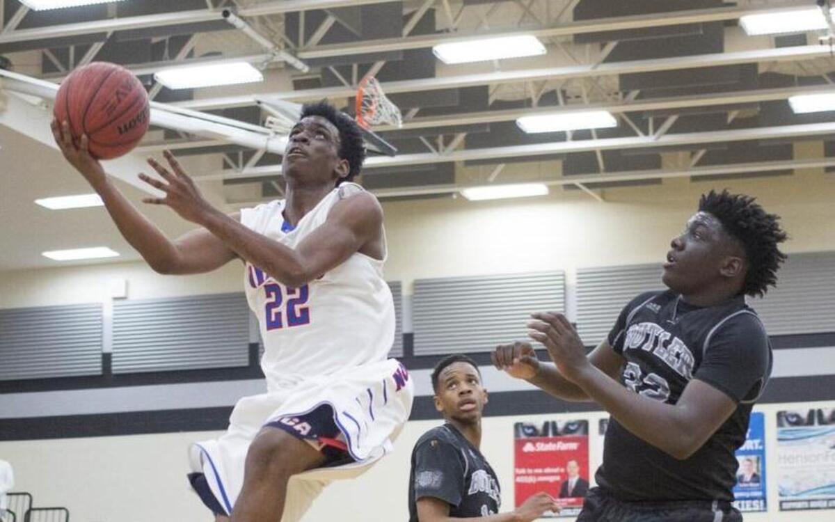 North Meck's Vaud Worthy (22) and the Vikings, along with many area teams, begin play in post-Christmas tournaments this week. Photo by JASON E. MICZEK - Special to the Observer