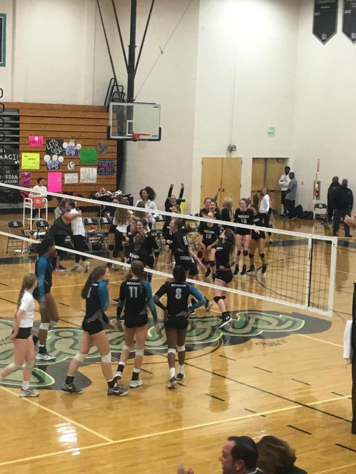 Hough celebrates winning the N.C. 4A Western Regional volleyball title Tuesday night