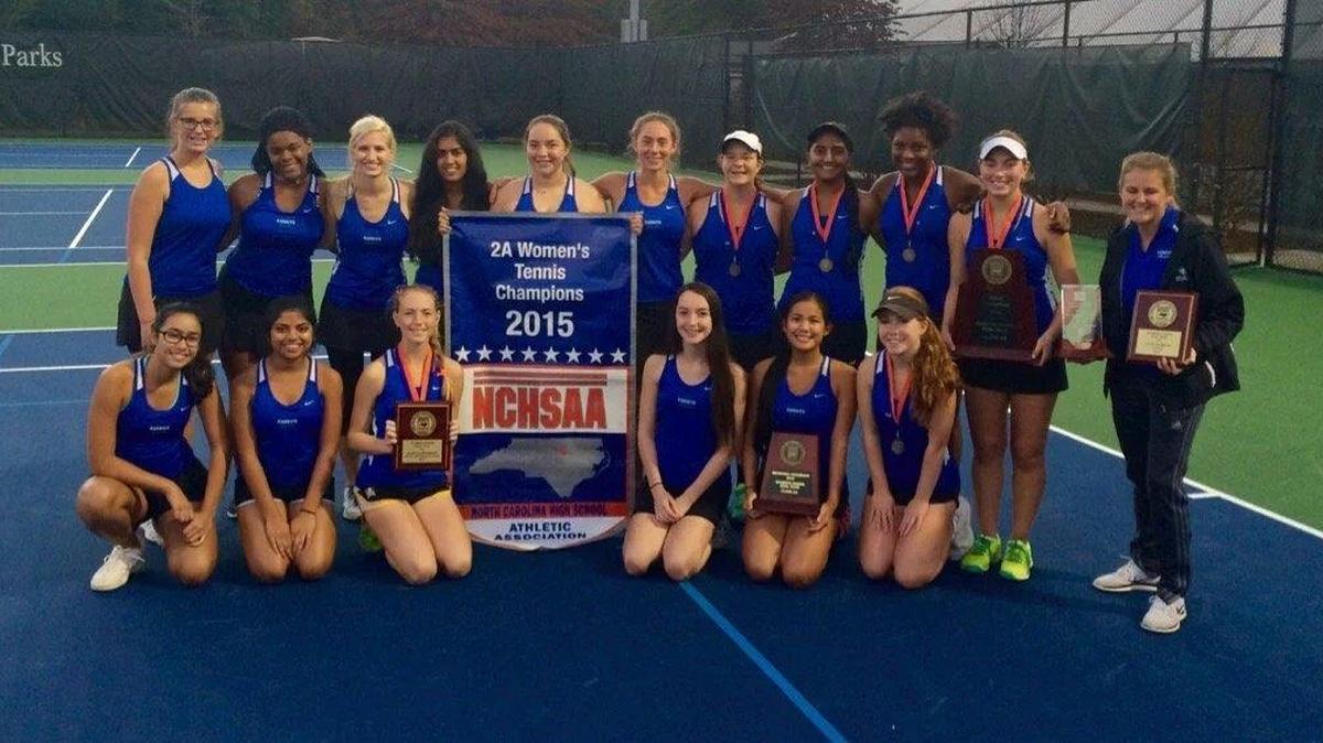 Lake Norman Charter’s tennis team celebrates winning the NCHSAA 2A state title Wednesday
