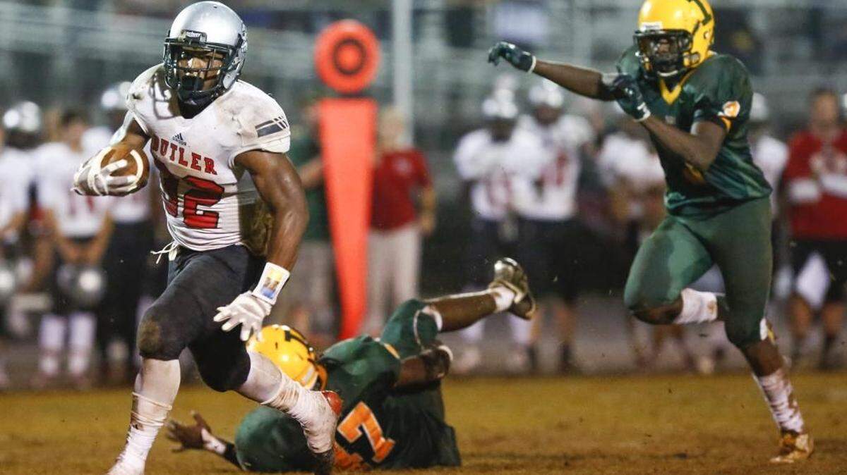 Butler running back Benjamin LeMay runs downfield for a touchdown against Independence during the Southwestern 4A championship prep football game at Independence High on Friday.