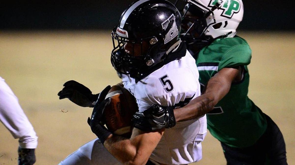 Hough wide receiver Nolan Groulx, left, and the Huskies remain No. 1 in the Charlotte Observer Sweet 16 poll this week.