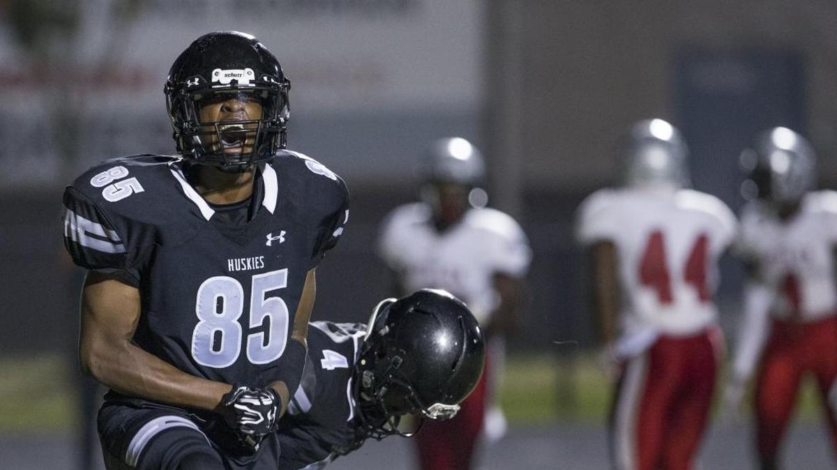 Hough's Damon Early (85) and the Huskies are screaming hot, winning six straight games and bolting back in the Observer’s Sweet 16.