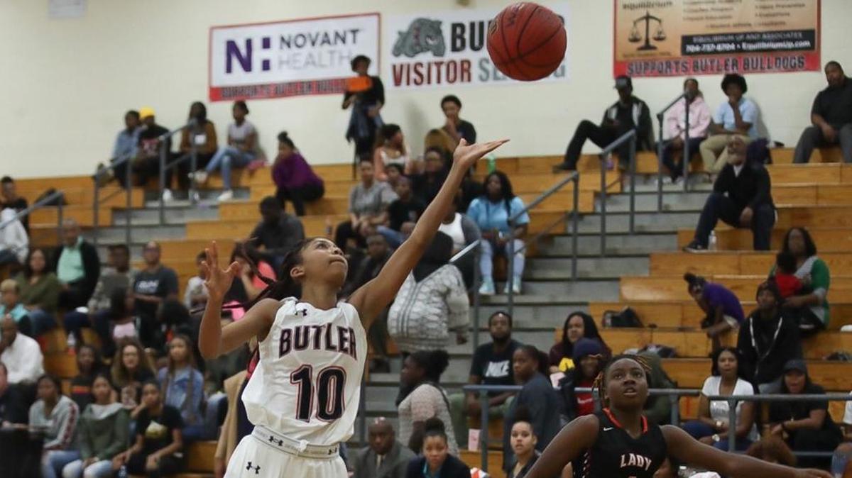 Butler's Payton Sutton (10) drives down the lane with the layup during early first half action against Rocky River Tuesday
