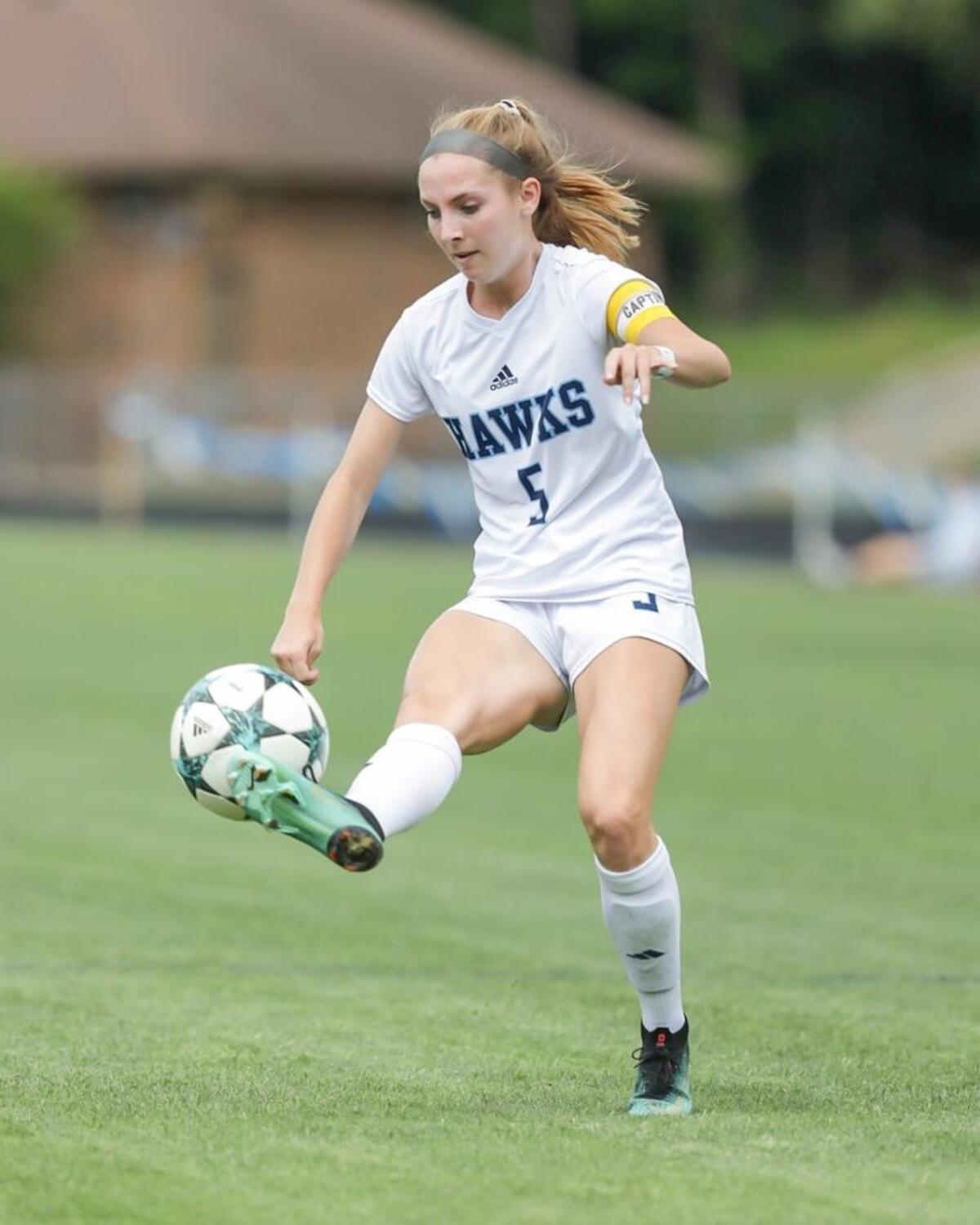 Charlotte Latins' Mary Elliott McCabe touches the ball around the Providence Day defender. Charlotte Latin would defeat Providence Day 3-1 in the NCISAA 3A Soccer State Championship Saturday May 19, 2018.