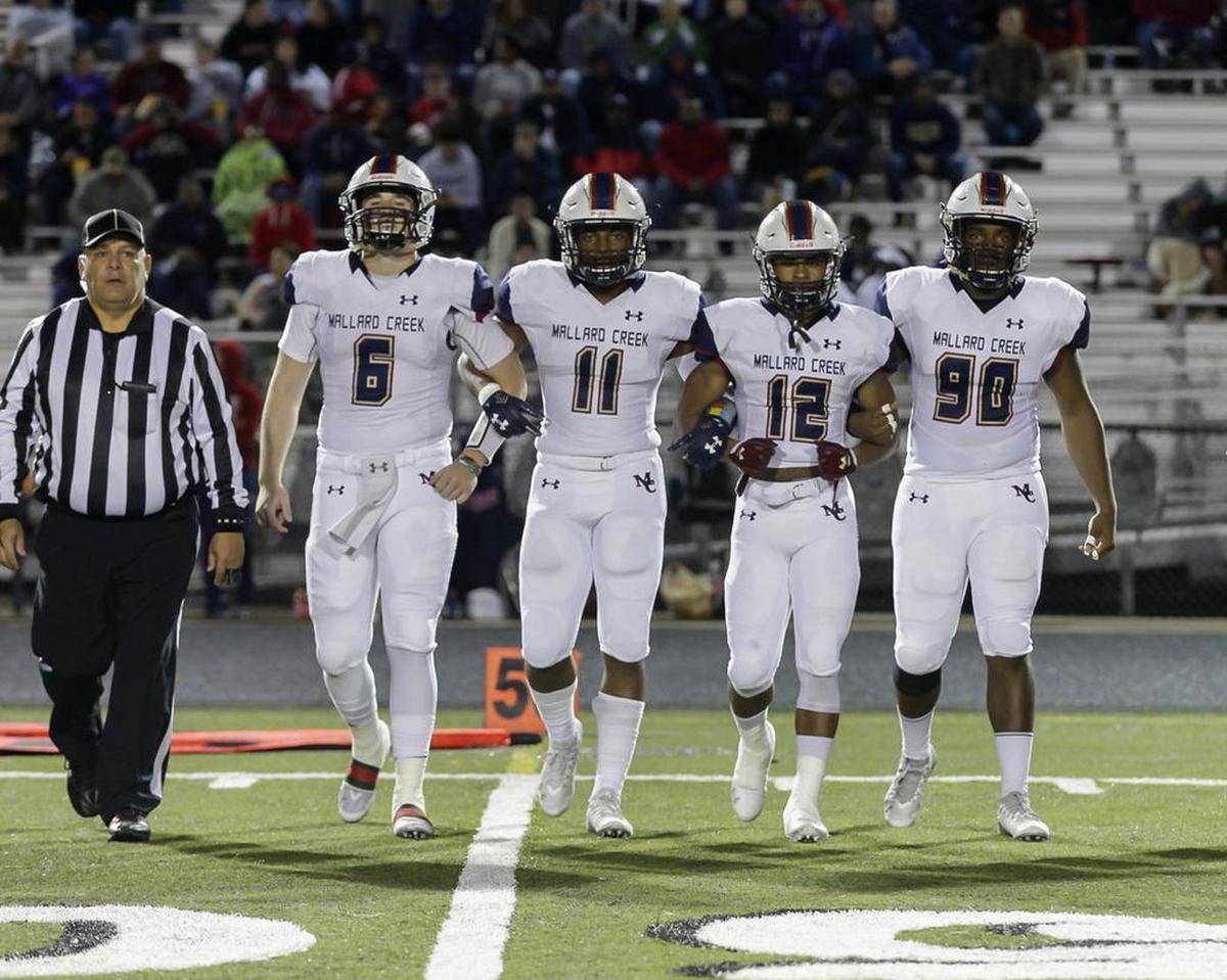 The Mallard Creek Captains -- from left, Casey Kelly, Jacob Roberts, Charles Mincey Jr., and