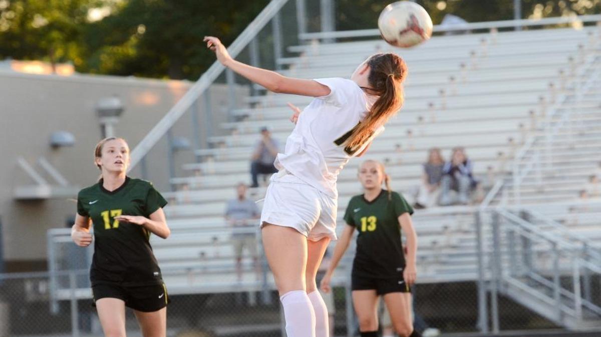 Ella Hackett of Providence heads a ball toward the goal against West Forsyth on Tuesday at Rocky River High.
