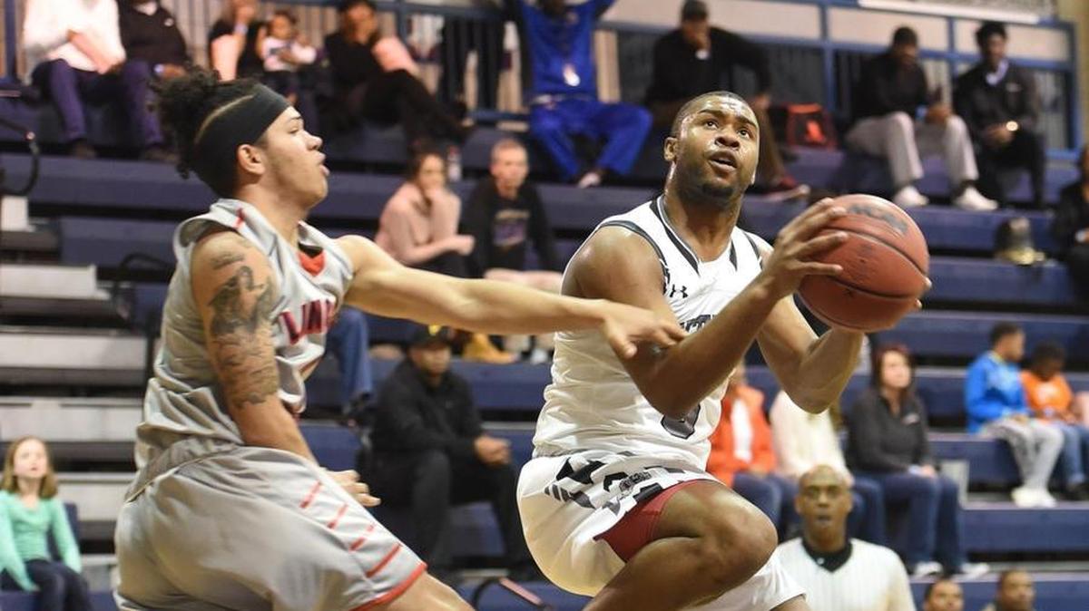 Butler’s D.J. Little (3) goes to the basket in Friday night’s Hoodie’s House national tournament game at Providence Day.
