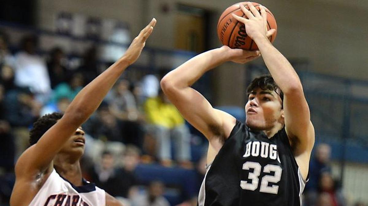 
UNC recruit Luke Maye (32) had 16 points and 15 rebounds in the N.C. East-West All-Star boys basketball game Monday. TODD SUMLIN - tsumlin@charlotteobserver.com
