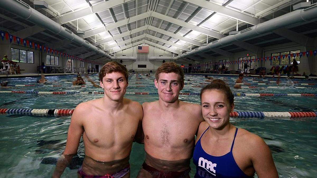 Major college recruits: South Meck's Graham Weaver (left, UNC), Nathan Murray (center, Tennessee), and Pine Lake Prep's Alyssa Marsh (Duke) at the Charlotte Latin pool. For The Observer's annual swimming preview
