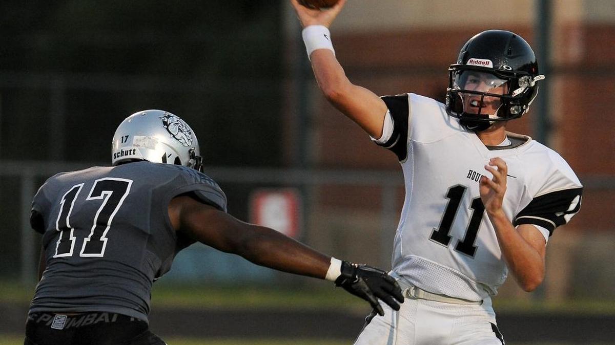 Hough quarterback Jackson Gibbs, right, and Huskies will play host to Butler Friday night. Butler (3-1) is No. 2 in the Observer’s Sweet 16. Hough (3-1) is No. 9.