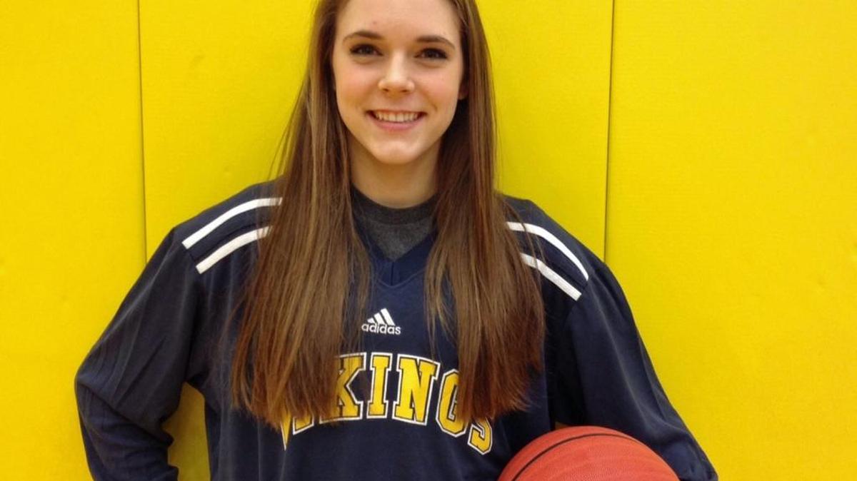 South Iredell’s Julia Scoles, posing for a basketball photo, is Gatorade N.C. volleyball player of the year