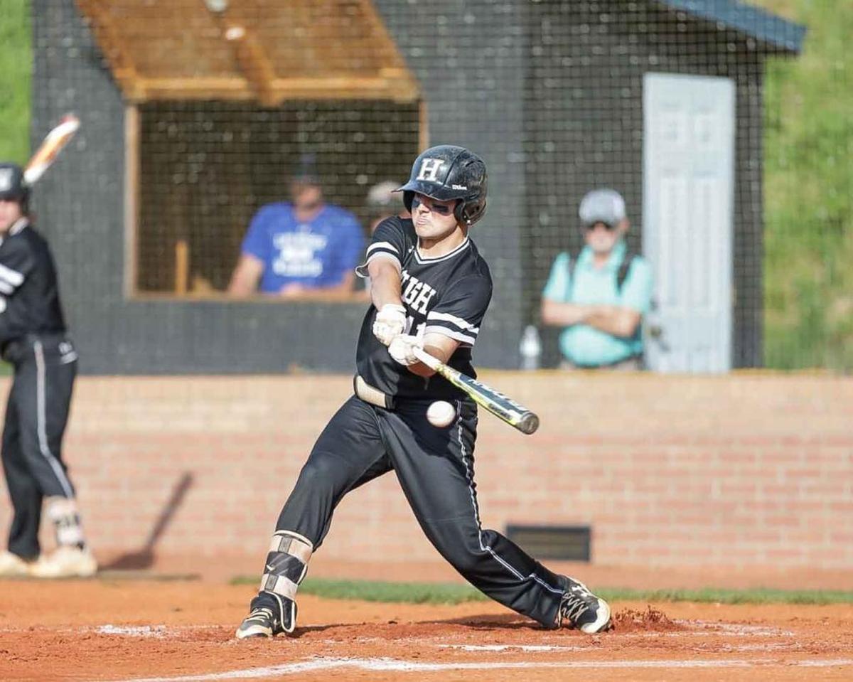Dylan Arment (11) gets the base hit during 1st inning play. Hough would face the number 1 seed Lake Norman Wildcats in the 4A I-Meck Tournament Championship.