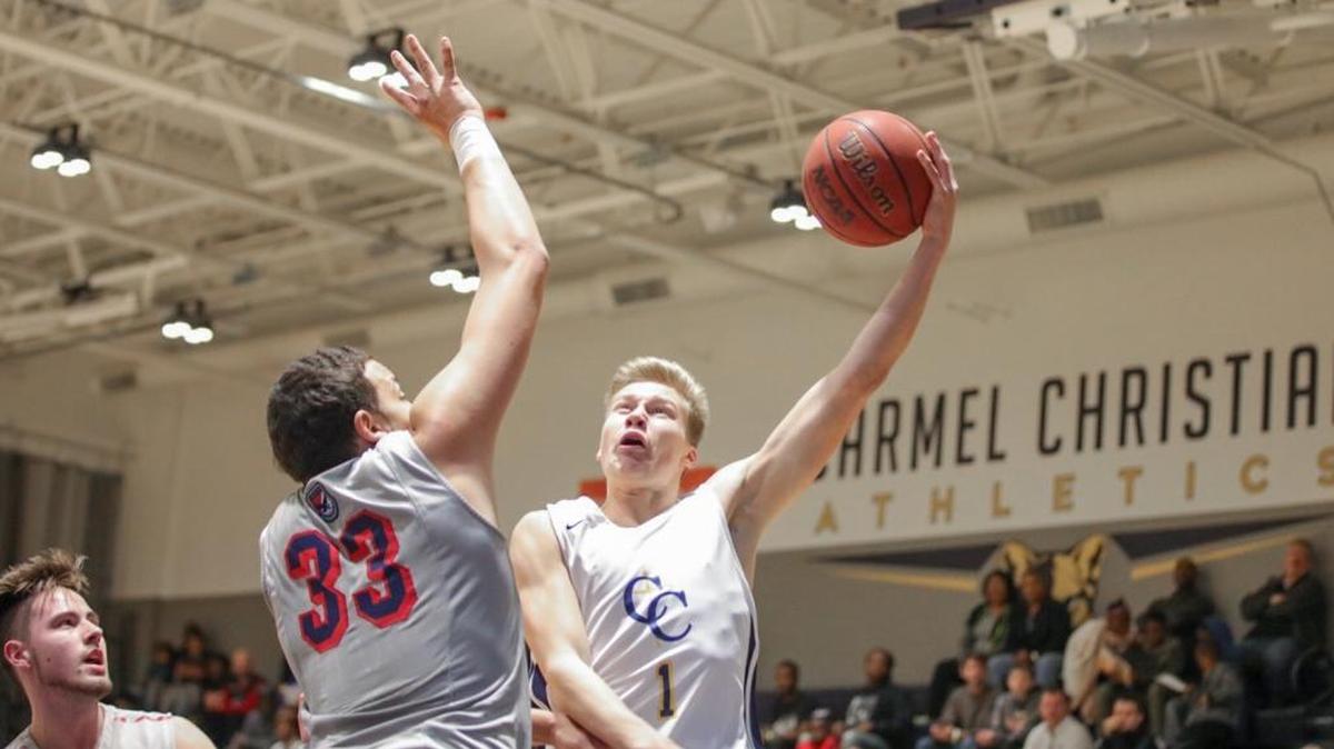 Carmel Christian Marten Maide (1) knocks down the layup in Monday’s MLK day game against Lincoln Charter.