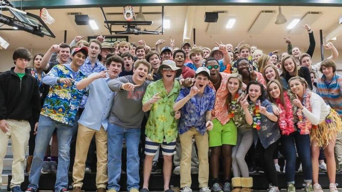 Student section at Charlotte Country Day delivered on the Hawaiian theme as they cheered on their Bucs against Charlotte Christian Tuesday.