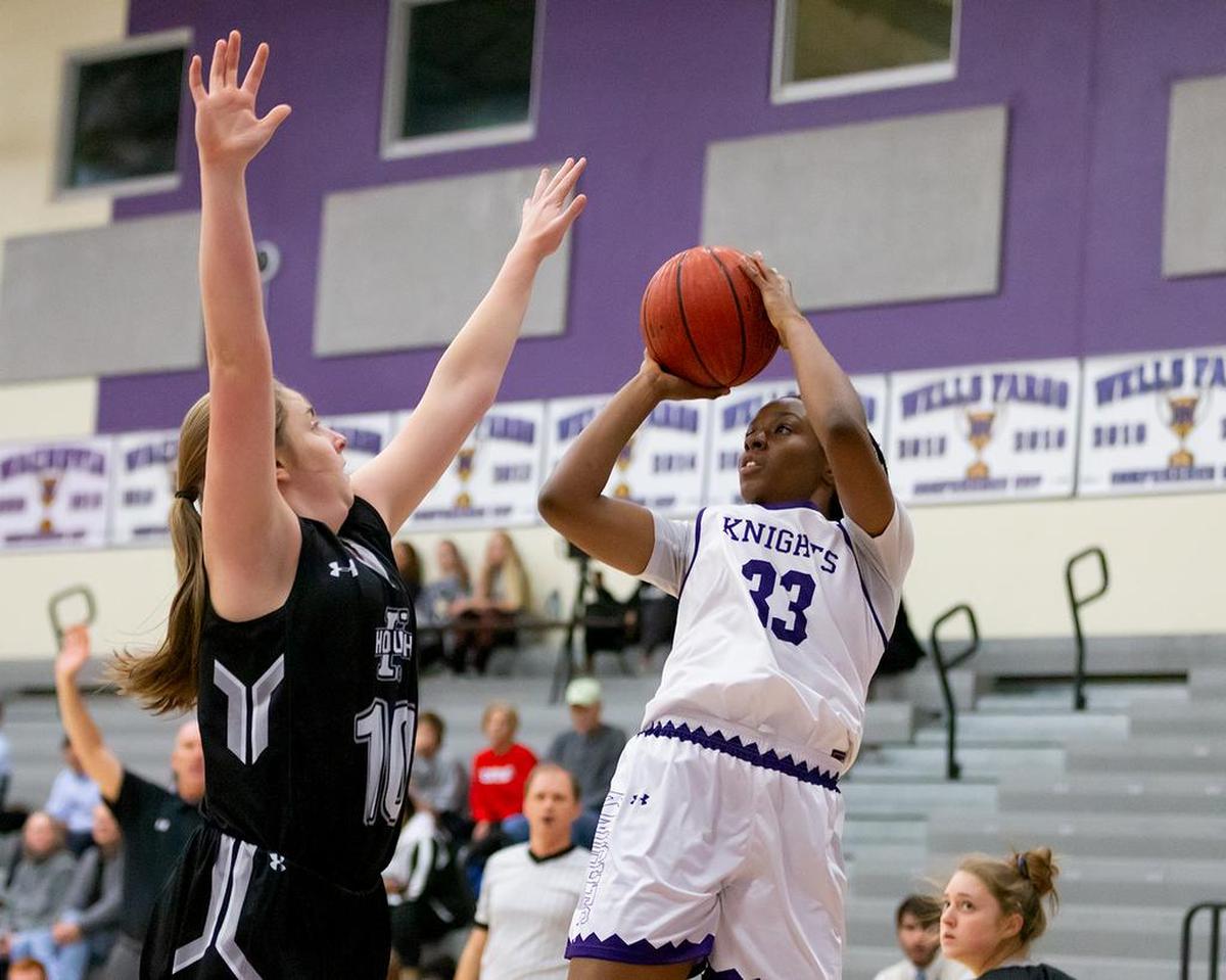 Ardrey Kell’s Michelle Ojo (33) led her team to a win over West Charlotte Friday.