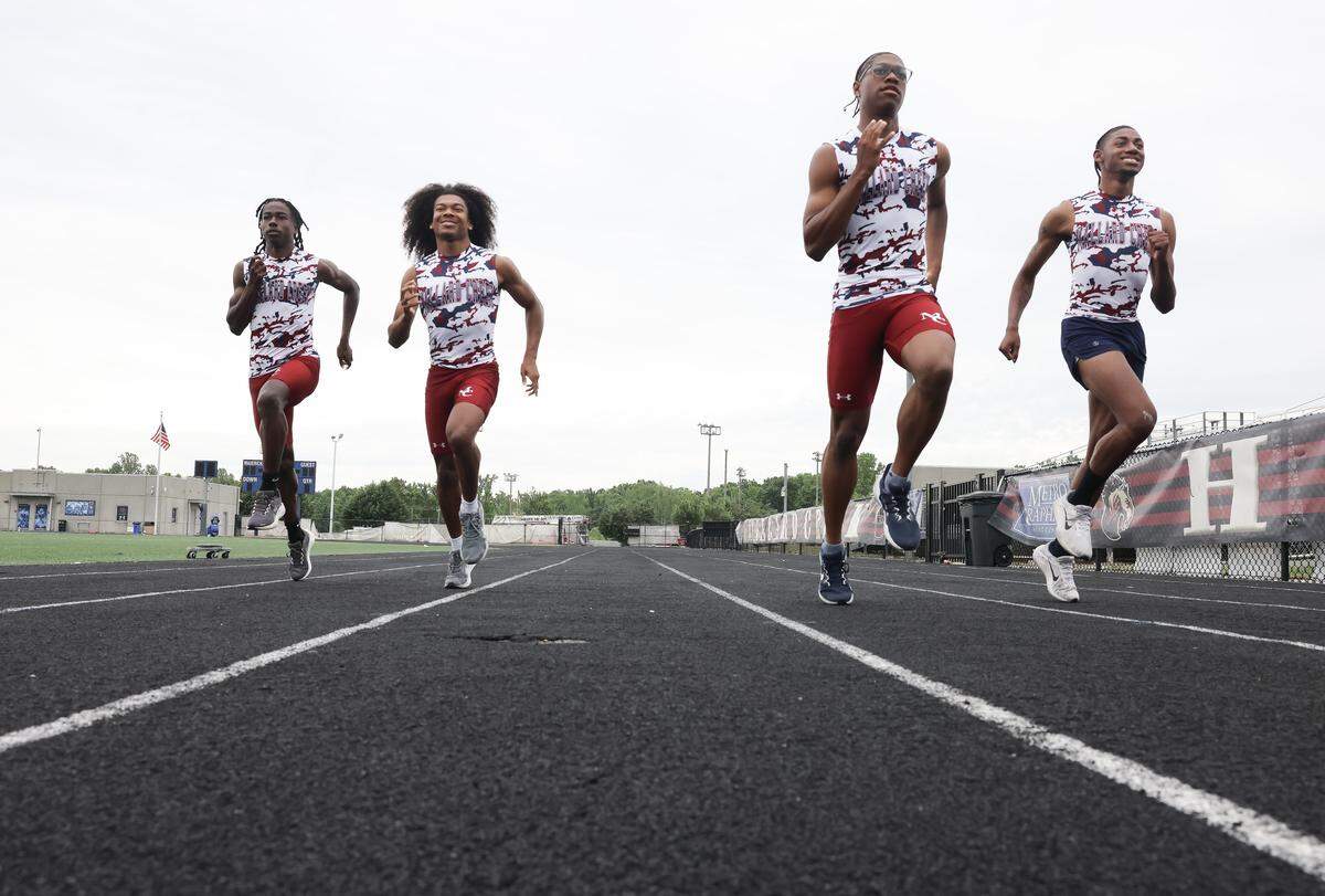 From left, Josiah Vaden, Mason Kelley, Nyan Brown and Roderick Orr run on the track at Mallard Creek High School in Charlotte on Monday, May 11, 2026.