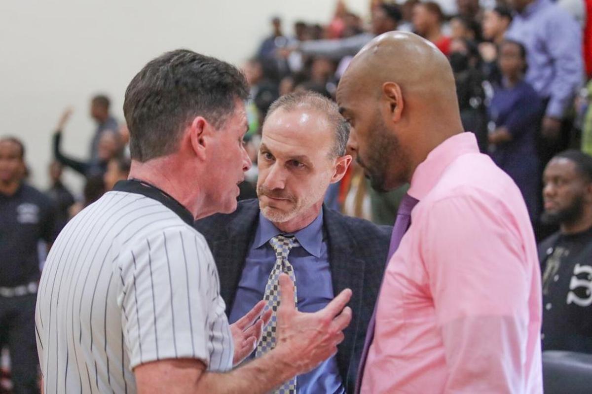 Butler's Myron Lowery and Rocky River's Jason Moseley discuss multiple technical fouls during Tuesday's matchup.