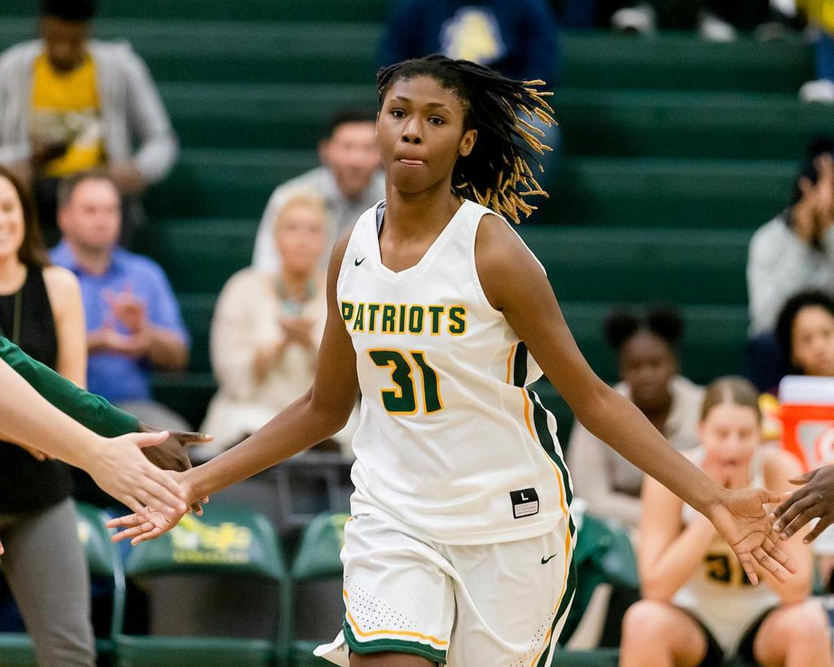 An Independence High girls player is introduced before Tuesday’s home game with Olympic