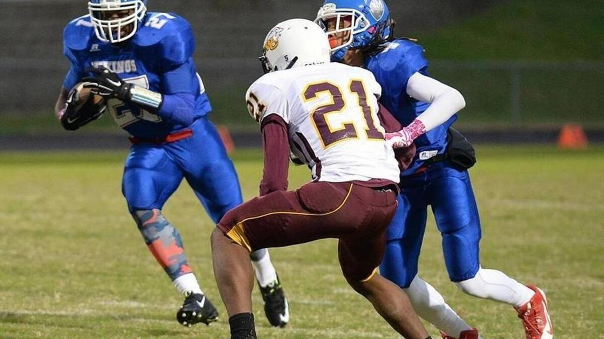 North Meck running back Emmanuel Wilson, left, has helped the Vikings go 4-0, their best start in nearly 20 years