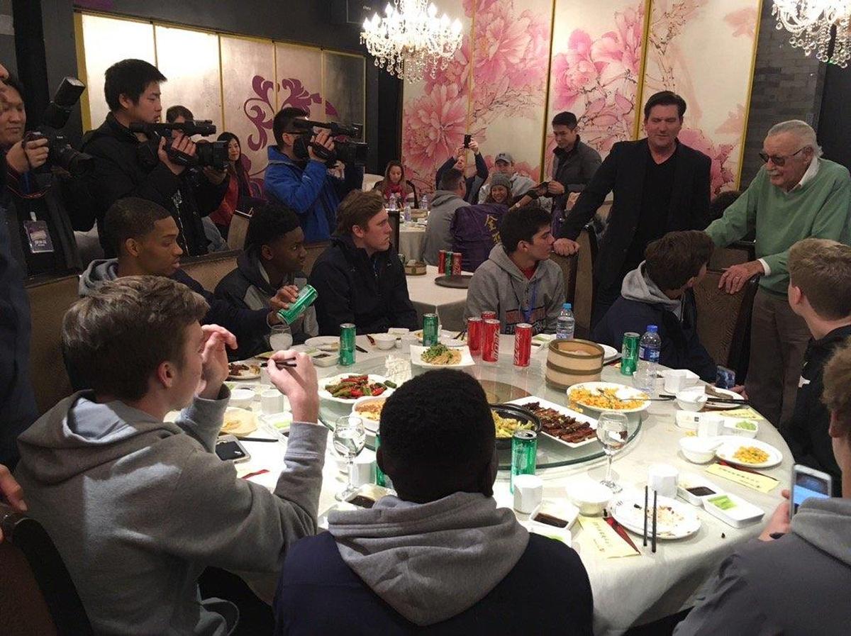 Marvel Comics creator Stan Lee enjoyed an authentic Chinese duck dinner with Providence Day’s boys basketball team in Beijing
