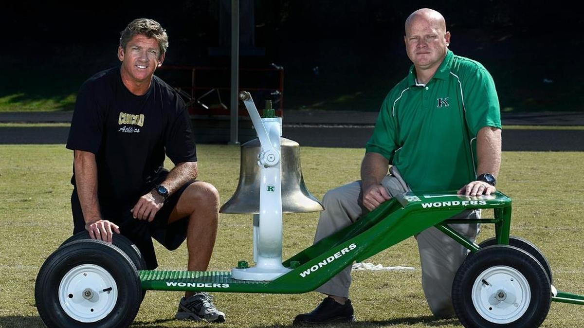 The Bell Game between A.L. Brown and Concord high schools is the gridiron talk of Cabarrus County every year about this time. Glen Padgett (left), the Spiders head coach, and Mike Newsome, head coach of the Wonders, got together recently on A.L. Brown's home field.