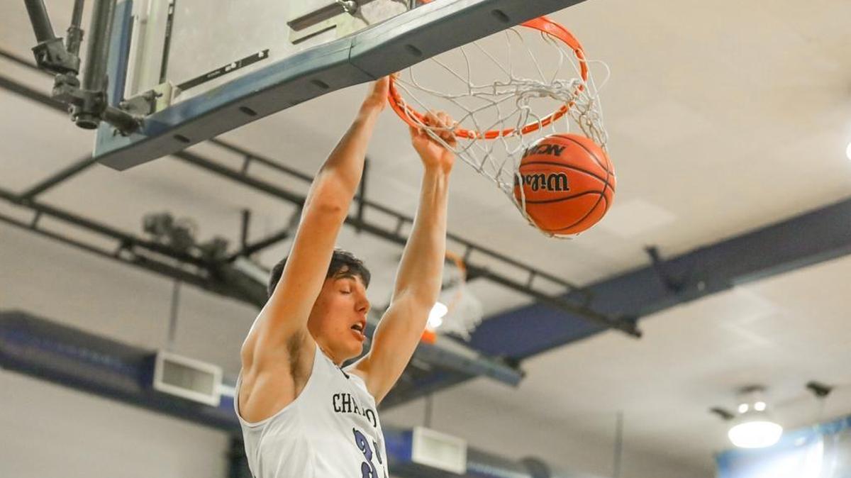 Charlotte Christian's Blake Preston (32) finishes the dunk during late 2nd quarter action. Preston and Charlotte Christian beat Cannon School in a CISAA showdown