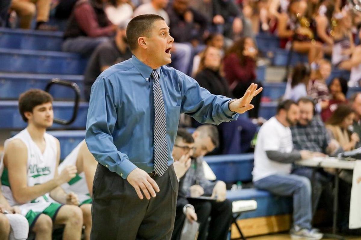 Weddington’s Head Coach Gary Ellington gives his team insruction to run a set play during early 2nd half action. Sun Valley would defeat Weddington at the buzzer 48-46.