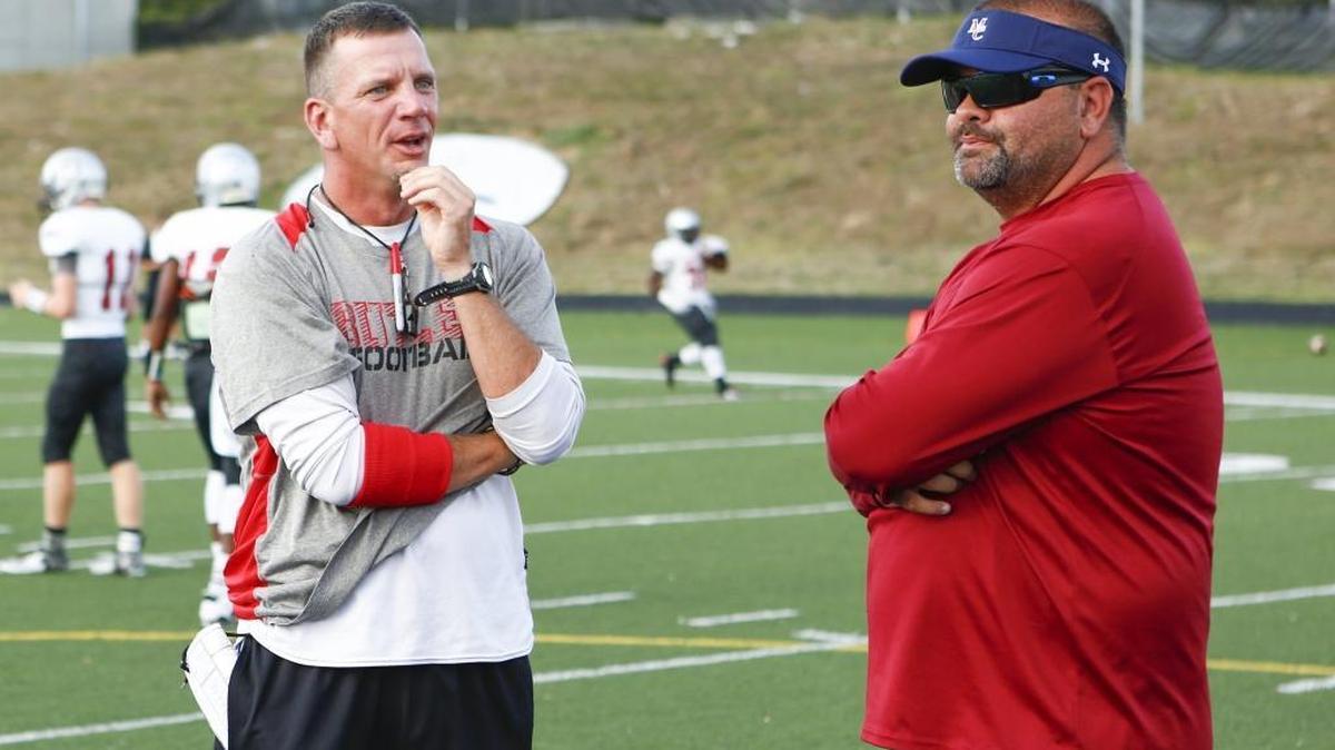 Butler coach Brian Hales, left, and Mallard Creek coach Mike Palmieri will lead their teams against each other Friday night in the second round of the N.C. 4AA football playoffs.