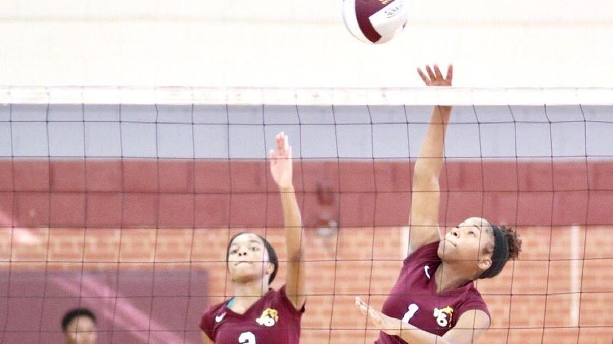 West Charlotte’s girls volleyball team in action