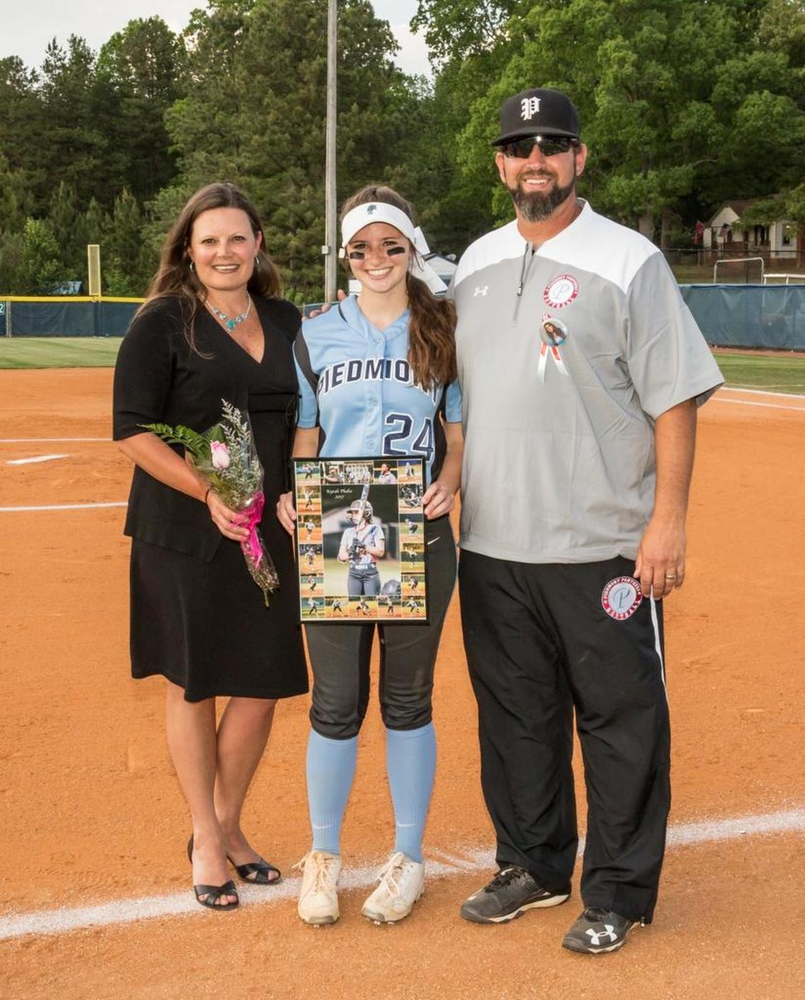 The Phelix family: mom Nicole, Kyrah and coach Jason Phelix of Piedmont High. Nicole is an assistant principal of a Union County elementary school