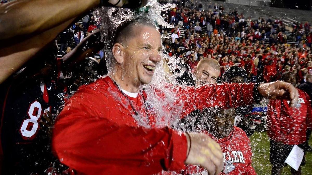 
Butler football coach Brian Hales has been apart of three N.C. 4AA state championships -- and championship celebrations -- since 2009.


