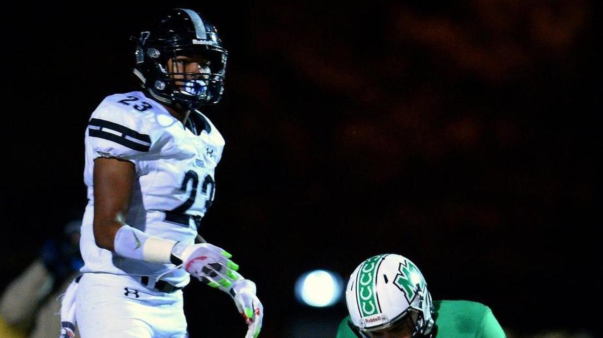Hough linebacker Kevon Hilliard, left, and the Huskies have a big home game Friday with unbeaten Mooresville.