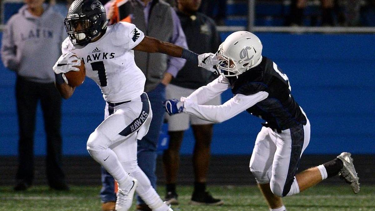 Charlotte Latin wide receiver Melvin Rouse, left, turned in one of the best receiving performances in Mecklenburg County history Friday at Charlotte Country Day