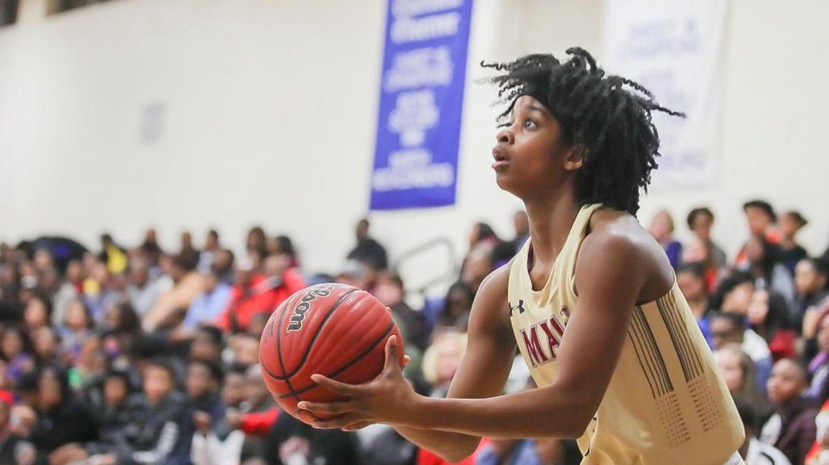 Mallard Creek's Janay Sanders shoots a 3-pointer during early second-half action. North Meck hosted Mallard Creek on Friday, Jan. 5, 2018.