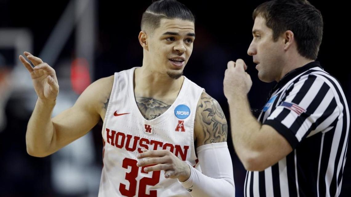 Houston guard Rob Gray talks to an official during the second half of an NCAA men's college basketball tournament first-round game against San Diego State Thursday, March 15, 2018, in Wichita, Kan. Houston won 67-65. (AP Photo/Charlie Riedel)