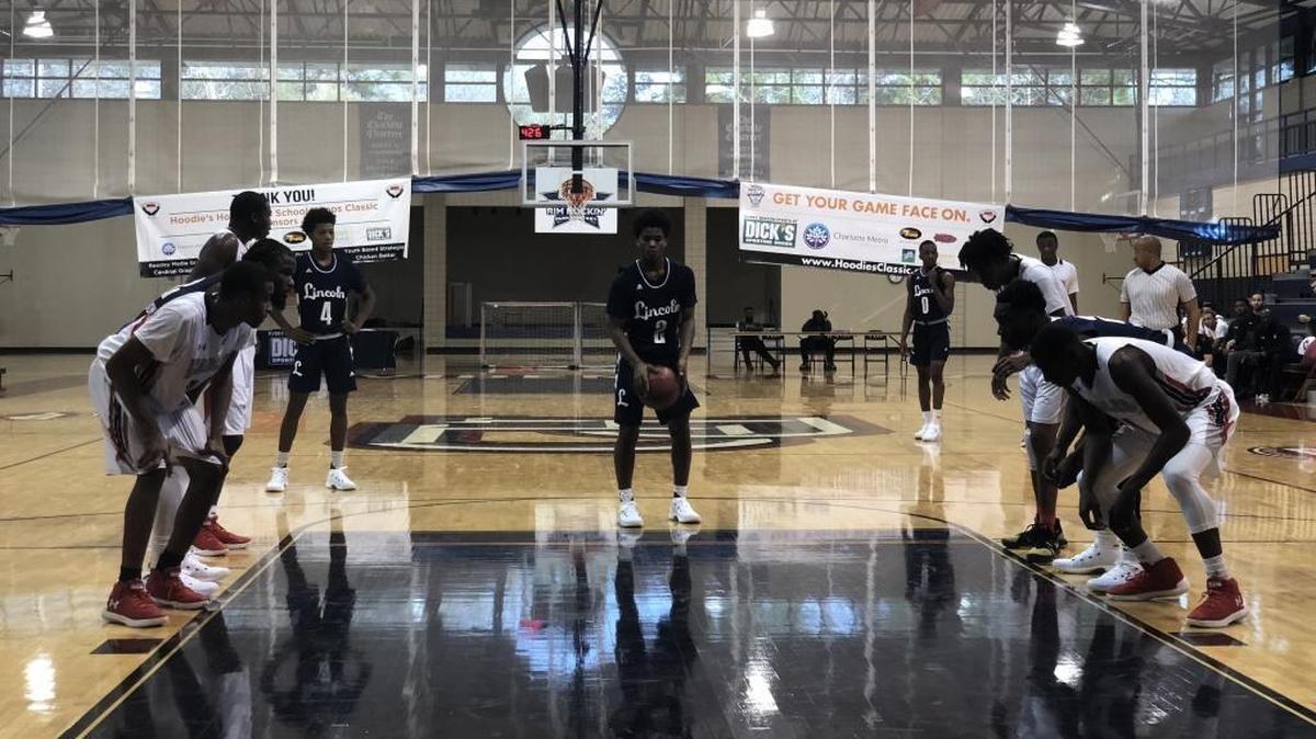 Lincoln High (in navy) defeated Edgewater (FL) in an early game at the Hoodie’s House tournament at Providence Day School