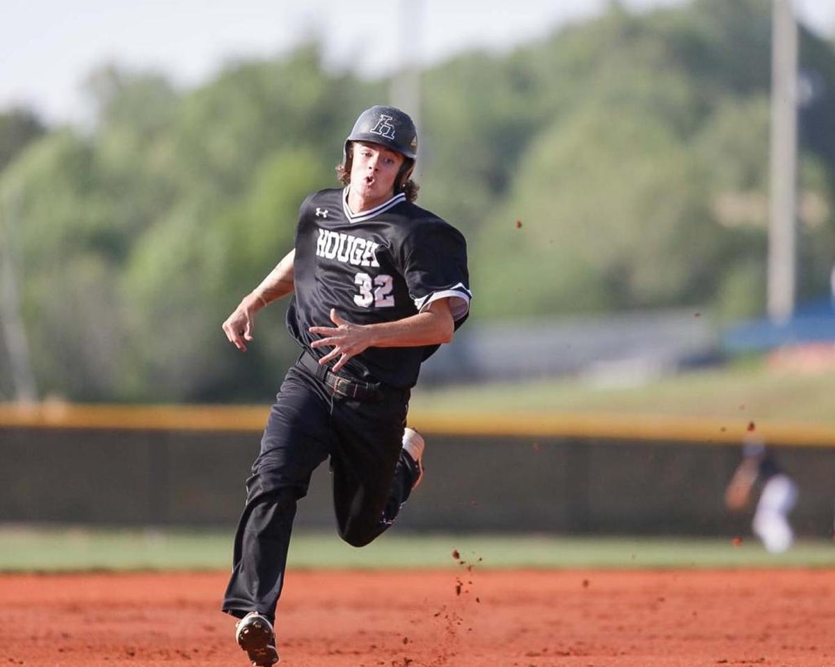 Houghs' Luke Osteen rounds 3rd base and scores the Huskie's first run of the game. Hough would face the number 1 seed Lake Norman Wildcats in the 4A I-Meck Tournament Championship.