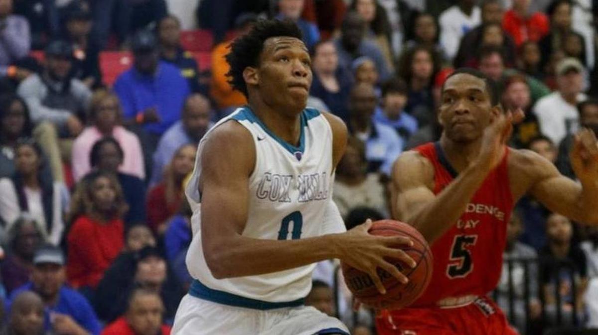 Wendell Moore of Concord Cox Mill (right) had a big game in a showdown with Isaac Suffren and Providence Day Saturday at the Chick-Fil-A Classic in Columbia. Suffren and the Chargers won 63-52