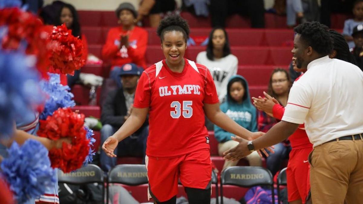 Olympic's Emily Barr (35) is introduced in the starting lineup before Friday’s game against Harding.