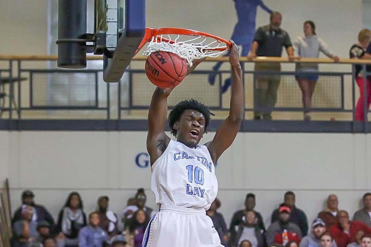 Gaston Day's Quan McCluney goes up for the dunk as Gaston Day would host Spartanburg Day on Tuesday December 12, 2017.