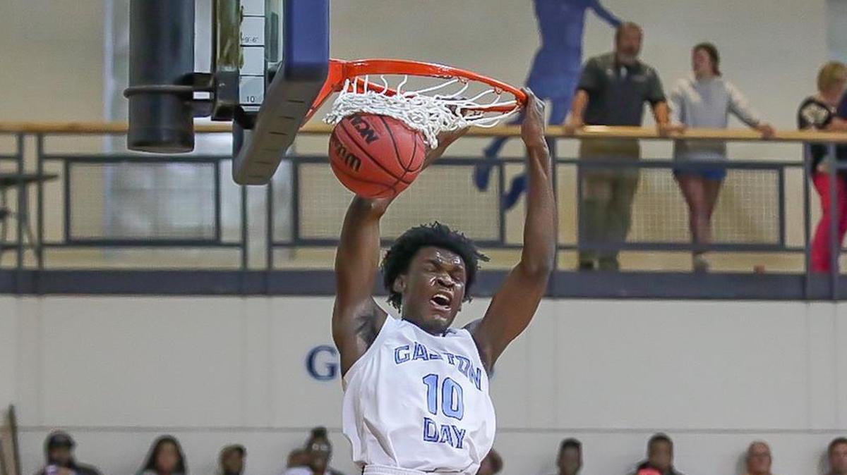 Gaston Day's Quan McCluney goes up for the dunk as Gaston Day would host Spartanburg Day on Tuesday December 12, 2017.