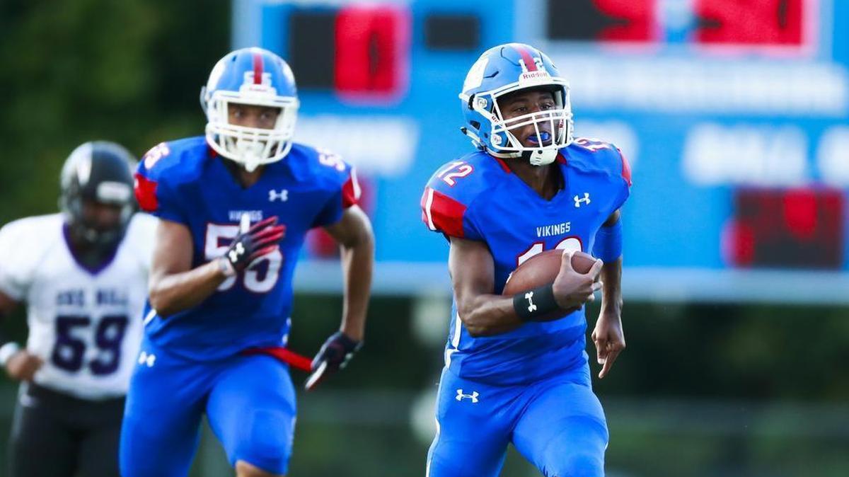 North Mecklenburg quarterback Aaron Scott, shown last week running for a 71-yard touchdown against Cox Mill, will lead the Vikings Friday night against Mooresville.